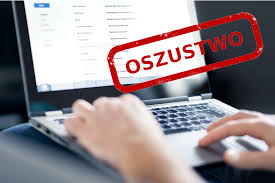 napis &quot;Oszustwo&quot; na tle komputera