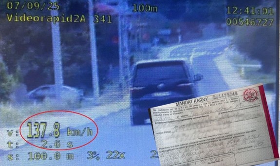 zdjęcie mandatu na tle ekranu wideorejestratora
