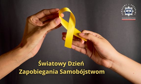 grafika z dwiema dłońmi trzymającymi żółtą wstążkę