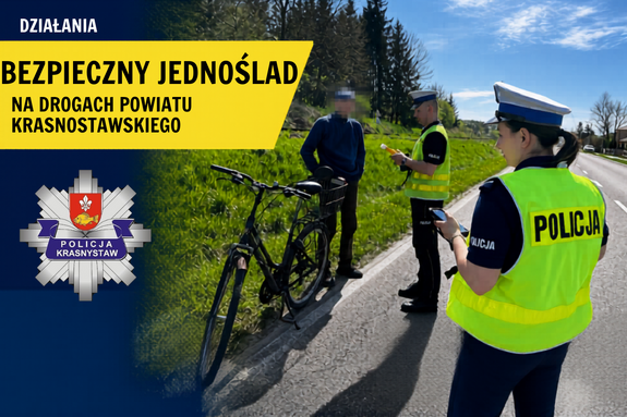 policjanci kontrolujący rowerzystę